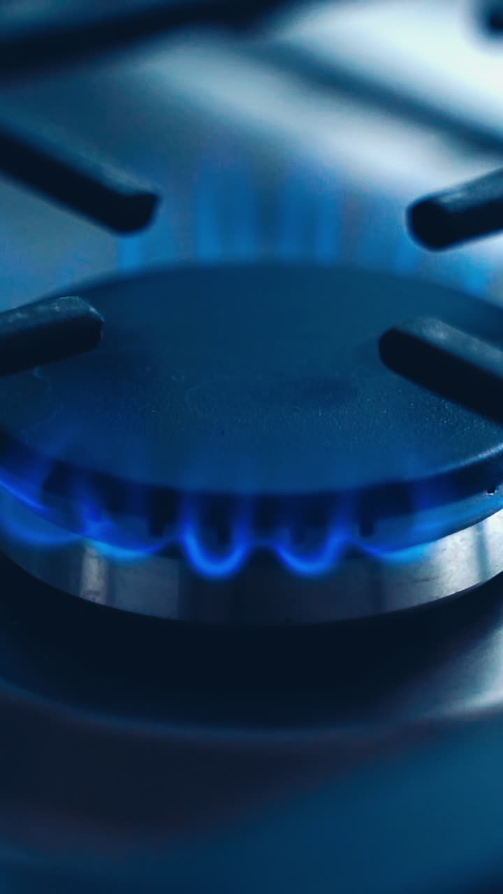 Burning blue flame of gas. Gas burning from kitchen gas stove
