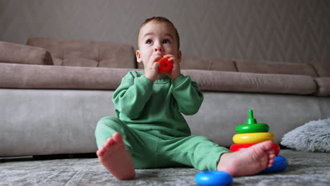 baby playing with stacking rings