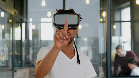 male executive using virtual reality headset in office 4k