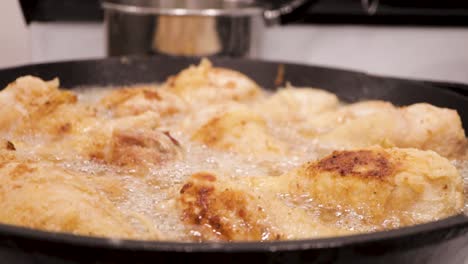 frying chicken drumsticks for dinner