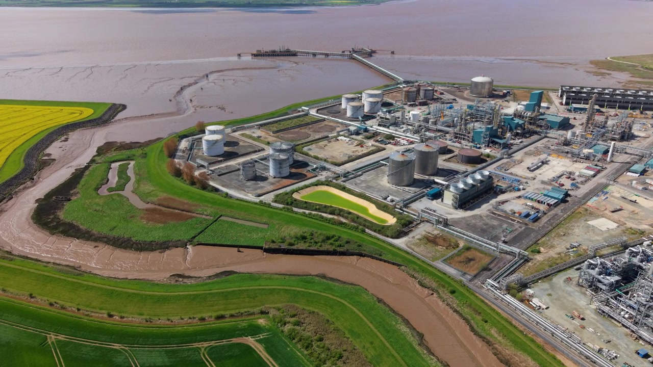 Chemical Park and Contrasting Salt Marsh with Drainage Channel Drone UK