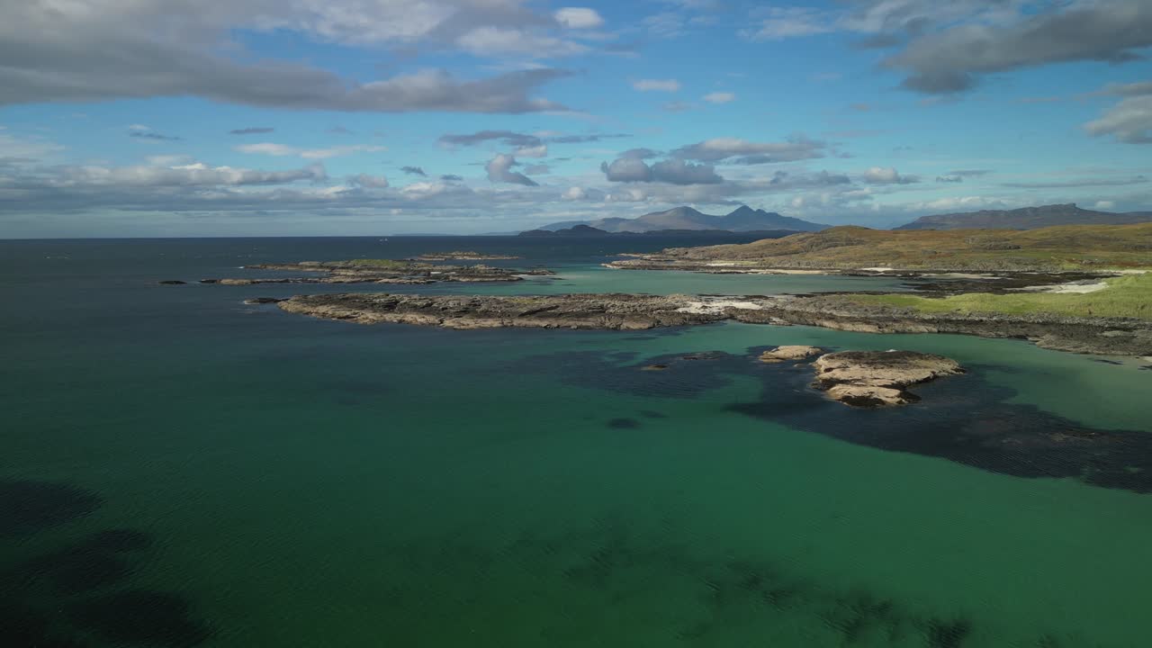 Aerial of Sanna Bay, Ardnamurchan, Scotland, sandy beach, aquamarine blue sea and rocky headland