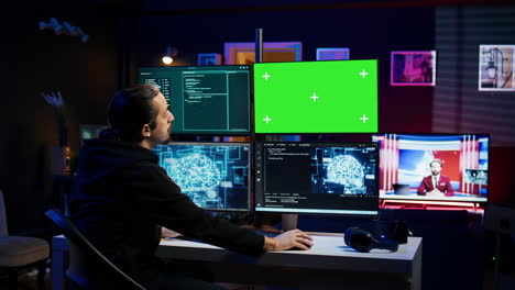 Hacker-using-green-screen-monitor-and-AI-to-write-spyware