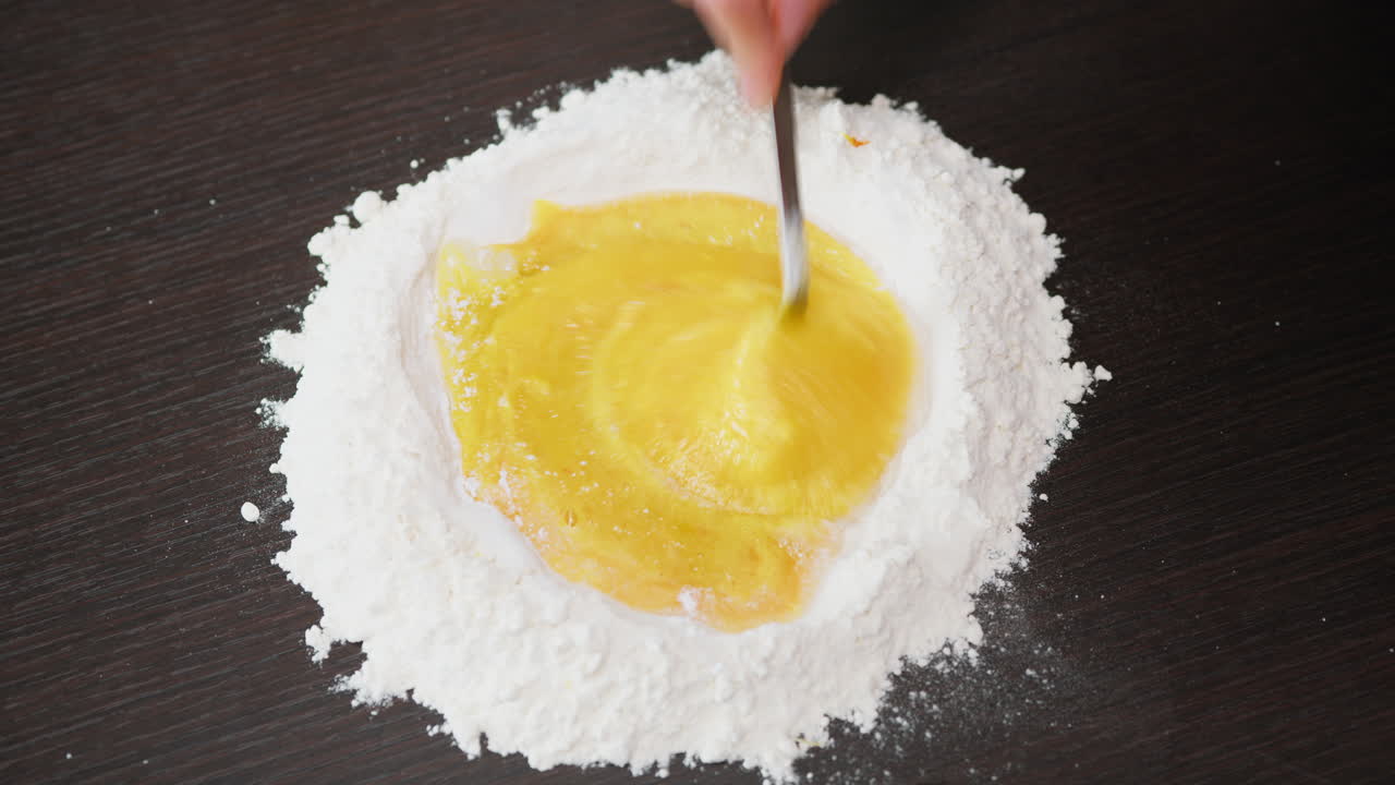 Preparation of Egg and Flour Dough for a Typical Calabrese Dessert