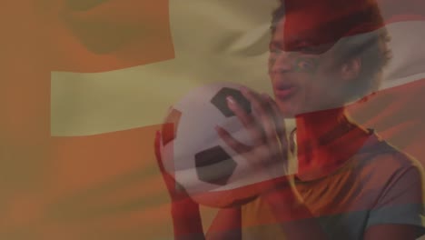 animation of fireworks, flag of switzerland over african american woman cheering with football