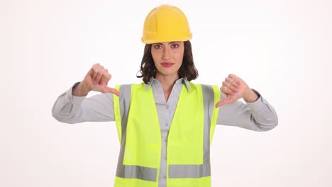 woman construction worker giving thumbs down