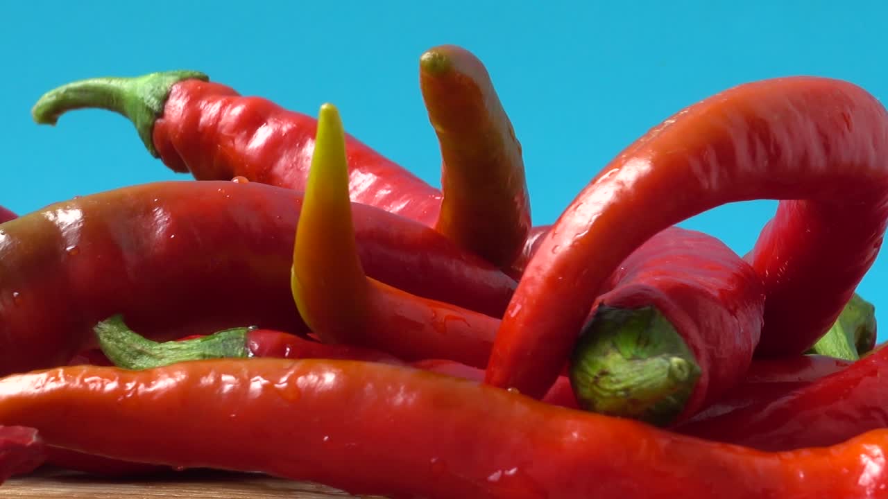 Red chilli, pepper. Shooting in the movement