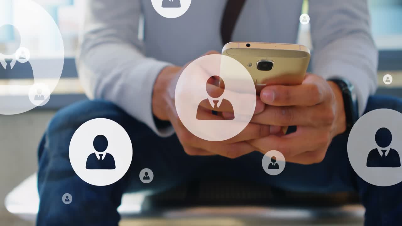 Animation of user icons over midsection of caucasian man using smartphone