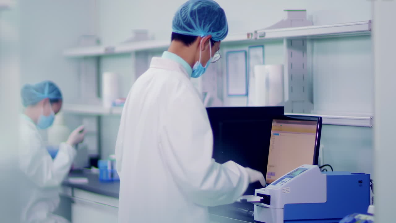 Laboratory where scientists, technicians in lab coats on cutting-edge research performing biological experiment, advanced equipment for forensic exam in lab or pharma, genetics, innovation in medicine