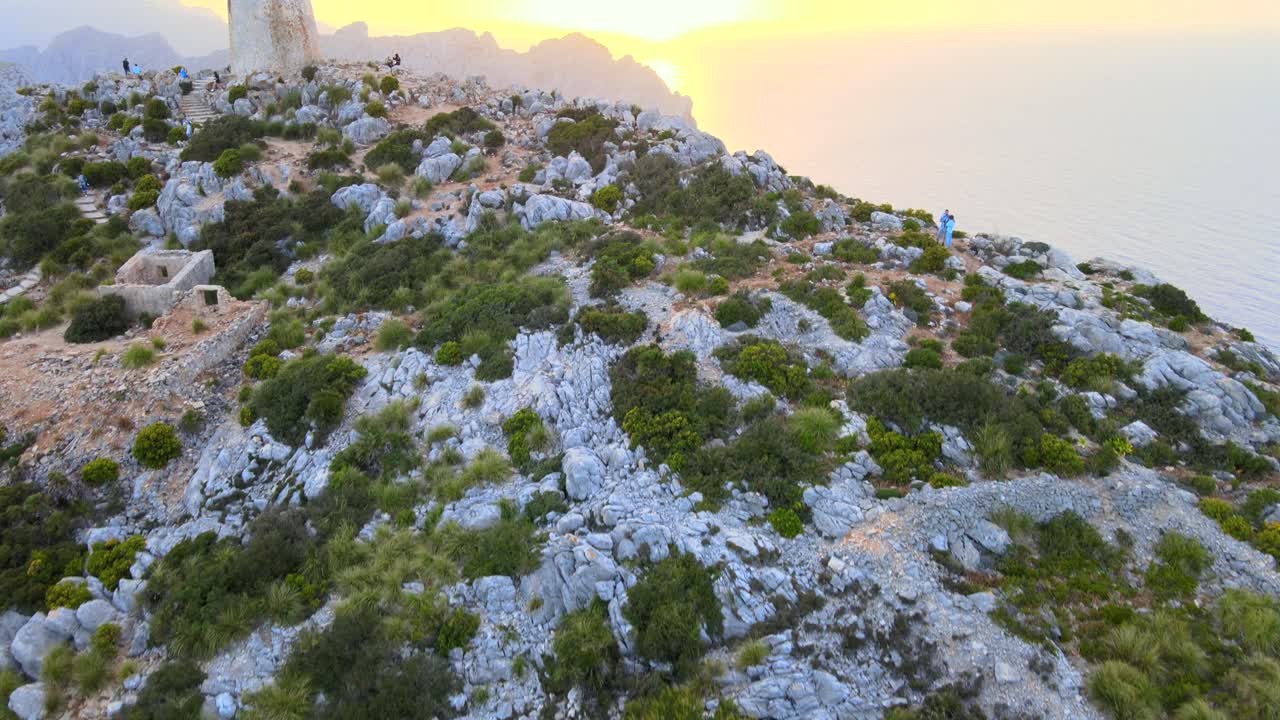 Enjoy breathtaking vistas over Pollensa Bay from the stunning Mirador es Colomer. The rugged cliffs and vibrant greenery create a picturesque backdrop at sunset.