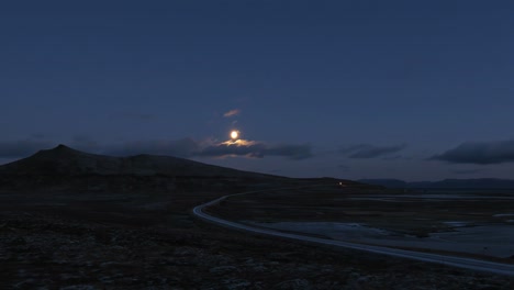 road against the rising moon