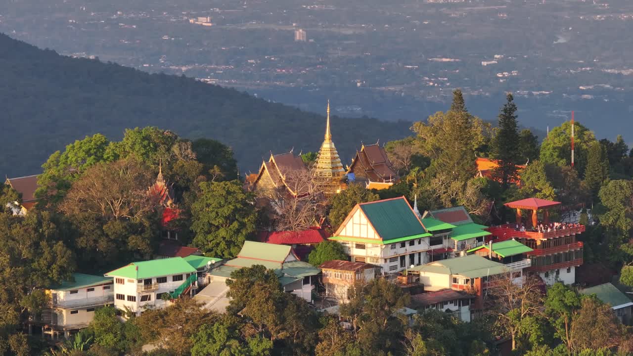 Beautiful aerial of Doi Suthep Temple with golden pagoda on hill top in Chiang Mai, Thailand