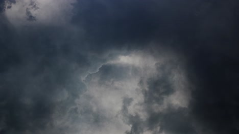 thunderstorms-and-dark-clouds-moving-with-lightning-strikes