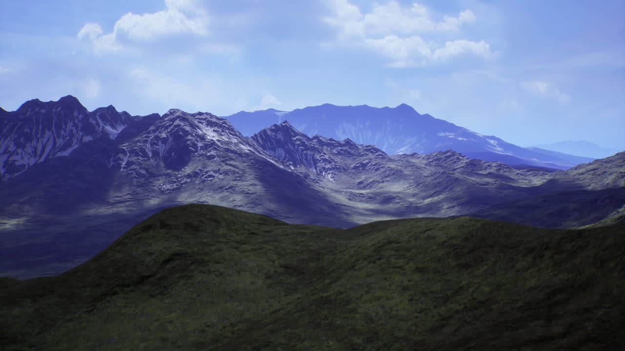 Majestic mountain landscape with rolling hills and clear blue sky