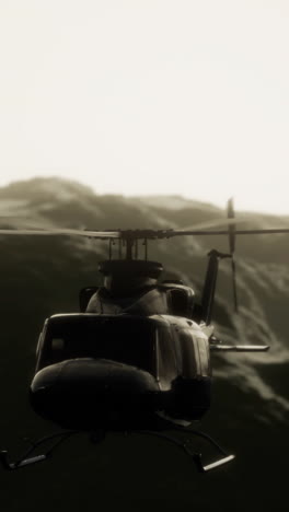 helicopter flying over mountains