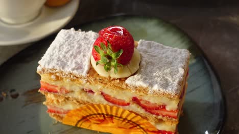 delicious strawberry mille-feuille cake with powdered sugar