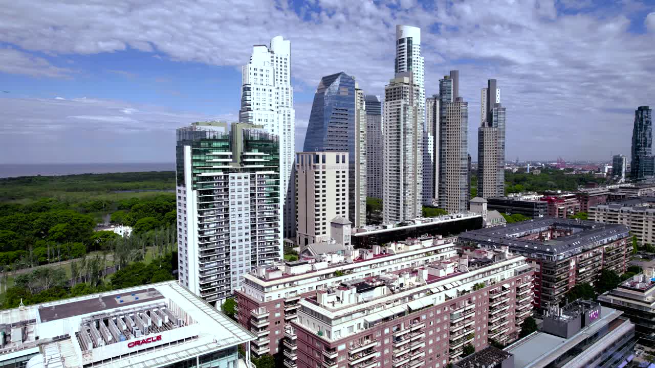 Puerto Madero skyline Buenos Aires air view flying backwards on a sunny summer day