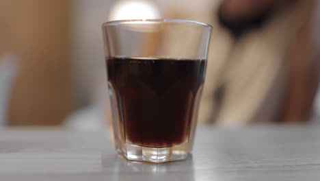 Glass-of-fizzy-drink-on-the-table