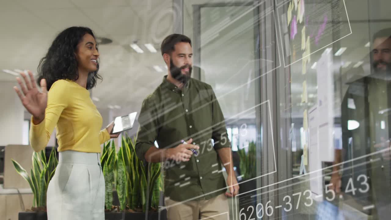 Animation of graphs, changing numbers, loading circles, diverse coworkers discussing on sticky notes