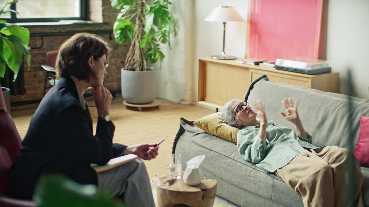 Senior Woman Complaining about Problems to Psychologist on Therapy Session