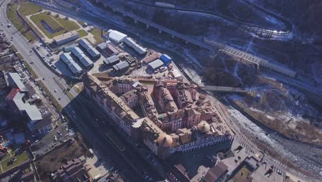 aerial view of a winter city with a complex of buildings and infrastructure