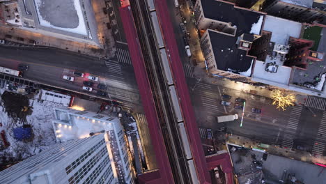 aerial view of the 1 train in harlem. shot on a winter evening in new york city