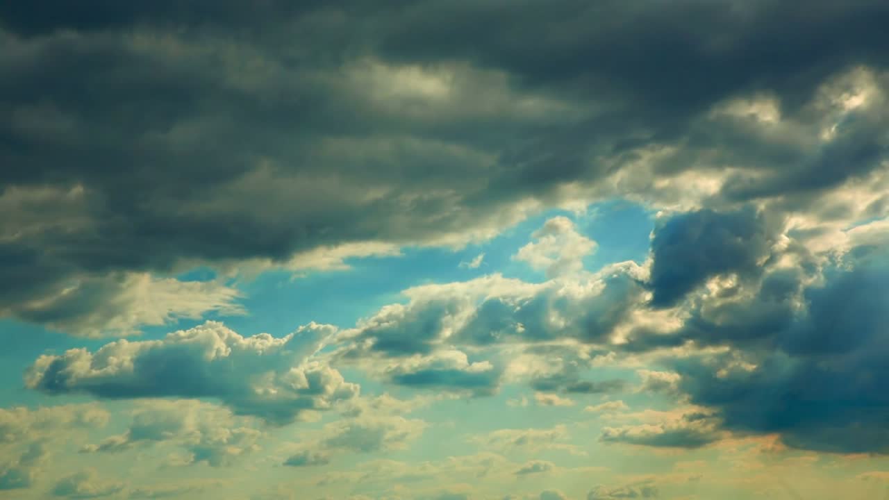 Clouds moving in the sky.