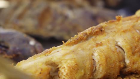 close up of a freshley caught and cooked fish on the bbq on a beach in senegal