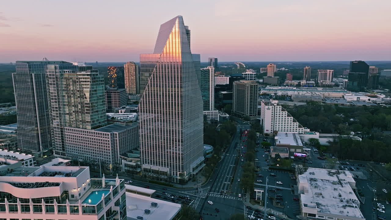 Aerial overview of office industrial retail blocks in Atlanta’s Buckhead neighborhood at dusk