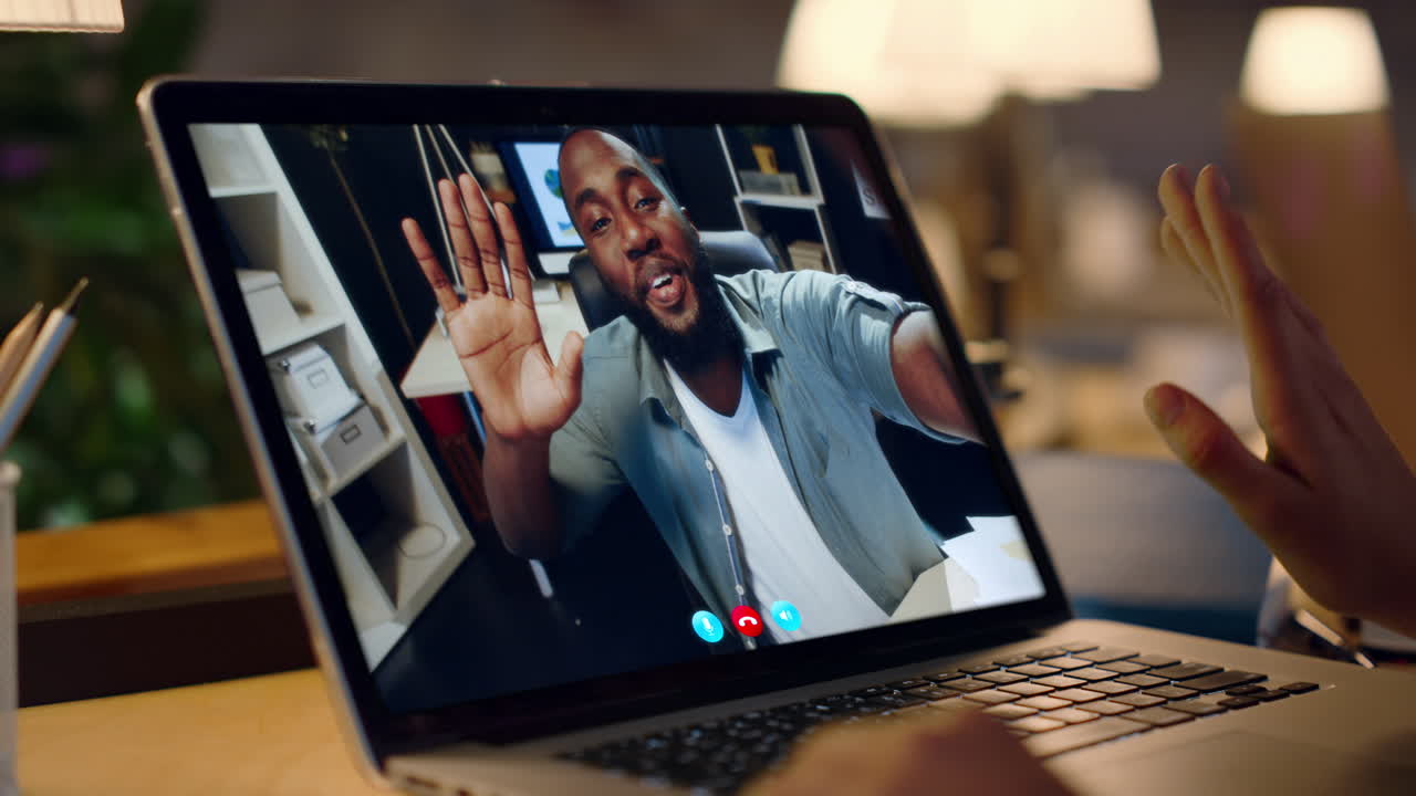 Man on Video Call Using Laptop