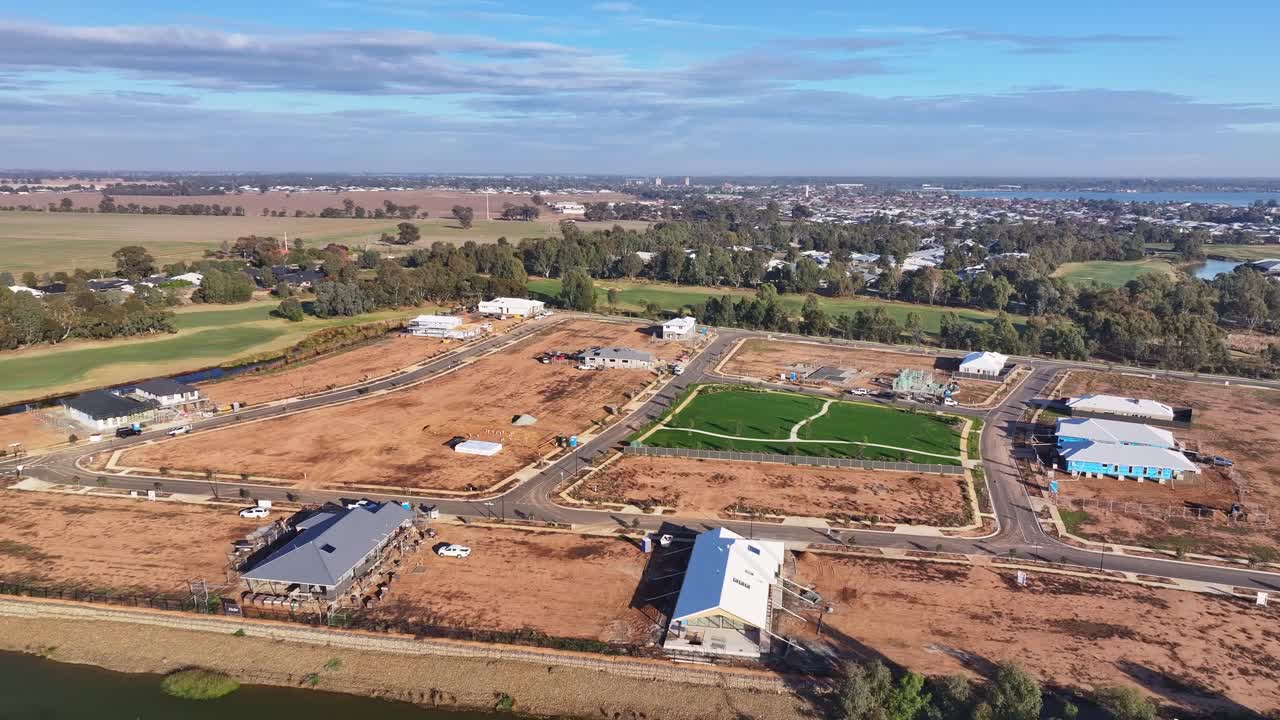 Estate construction begins beside golf fairways and open land