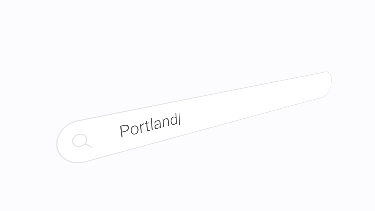 Typing Portland Into The Internet Search Field. Closeup Shot