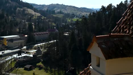 Traffic-passing-Bran-Castle-,-Romania,-Europw