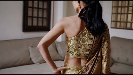 traditional indian saree with gold and purple embroidery