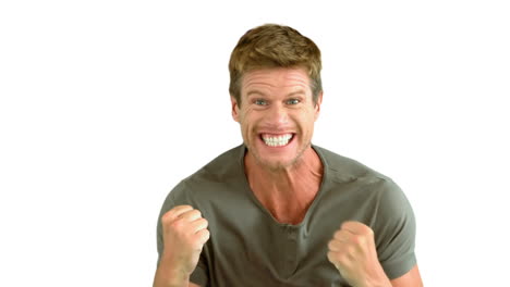 attractive man gesturing and showing his happiness on white background