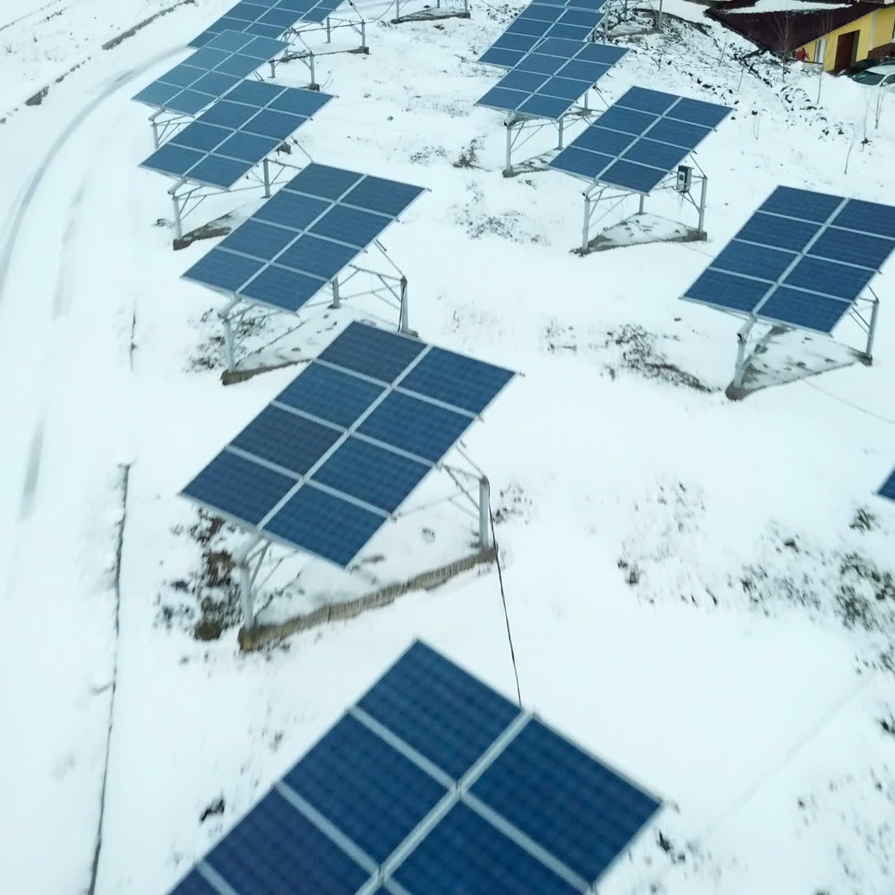 Alternative energy solar power plant in the winter. Solar power plant on the outskirts of the city.