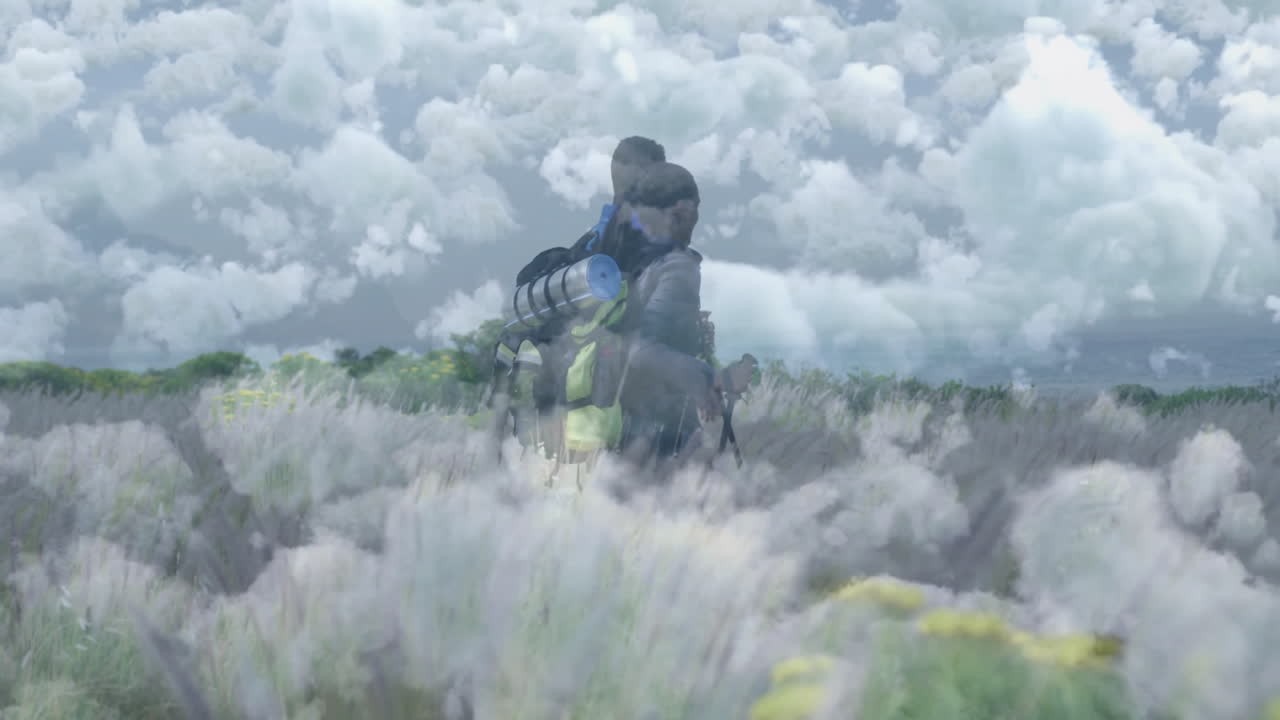 Hiking companions navigating grassland with backpacks in travel demo, showing animated route map