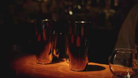 bartender prepares and ignites a cocktail