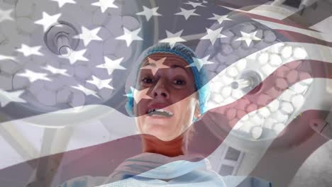 Animation-of-flag-of-usa-waving-over-surgeon-in-operating-theatre