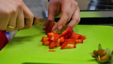 chopping strawberries