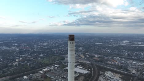 smoke stack industrial chimney, power plant. german ruhr area. aerial view.