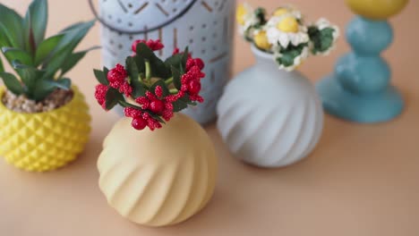 a table with vases and flowers as decoration