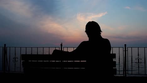 sadness alone man silhouette with seaview 1