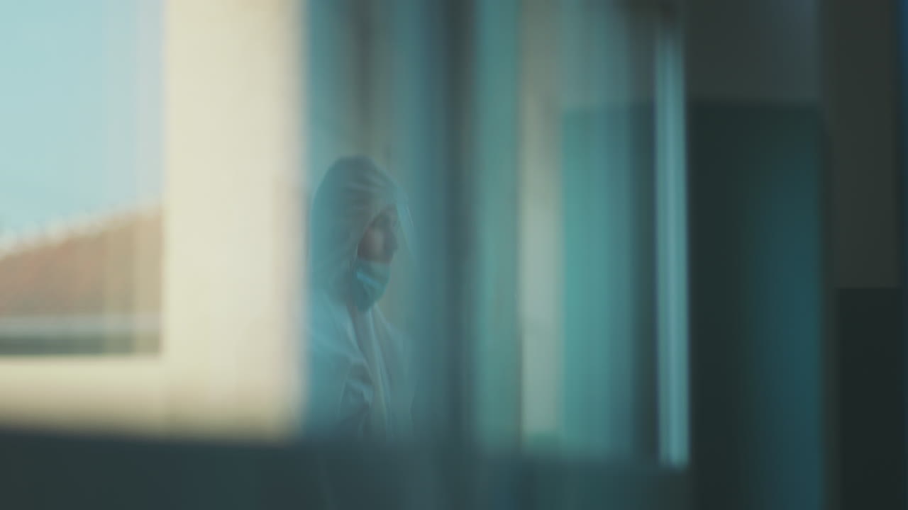 Reflected Person Through a Window