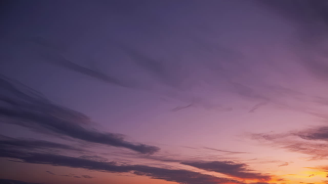 Purple and Pink Gradient Sky with Wispy Clouds