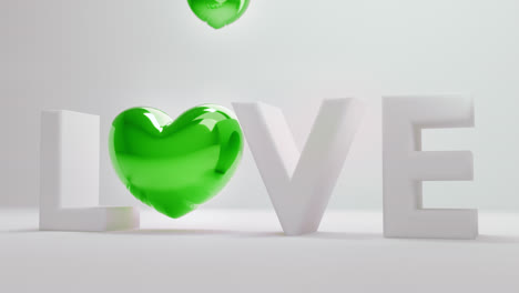 white love letters sign with the green heart instead of "o" letter