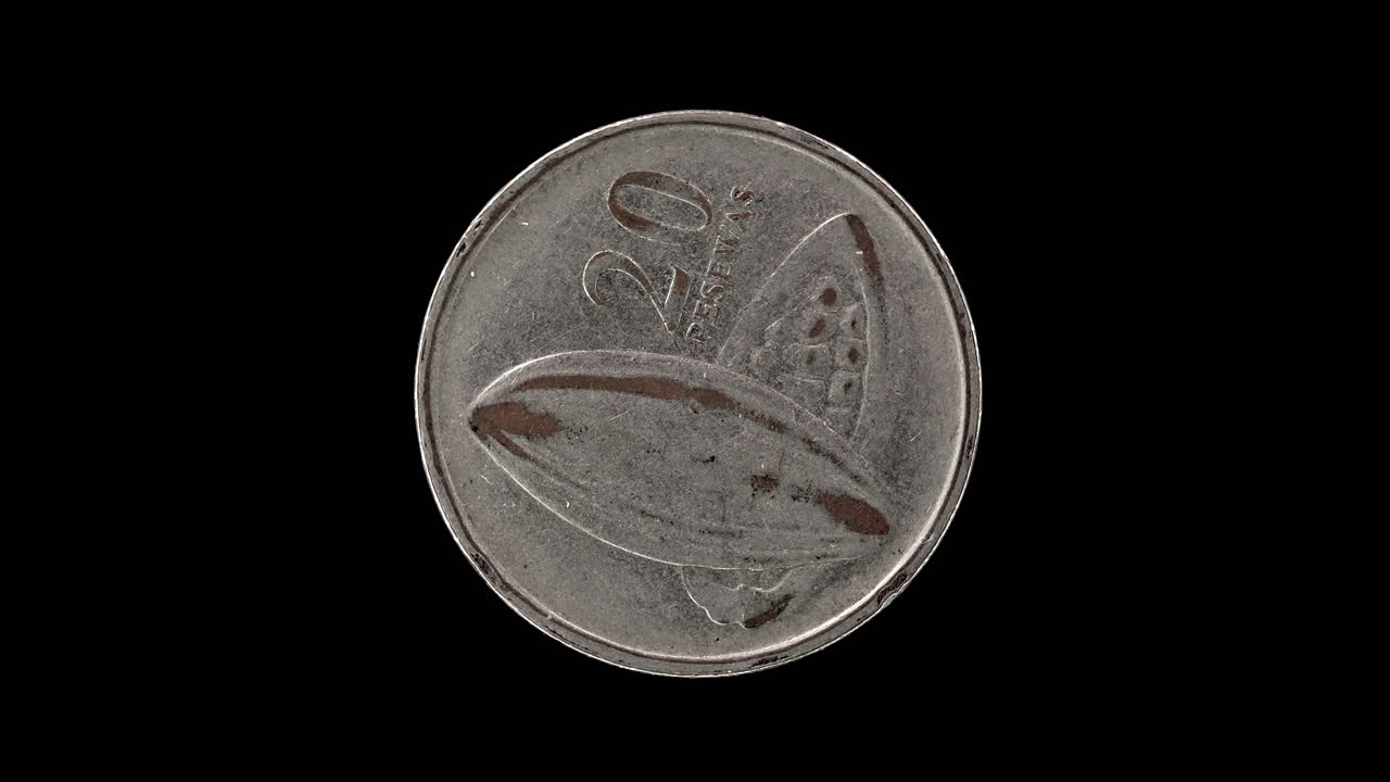 Ghana 2007 20 pesewas coin reverse with cocoa pod and denomination rotating on black background