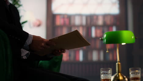 two espionage agents reviewing confidential documents in a vintage library