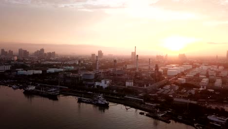 4k video : aerial view of oil refinery with sunrise