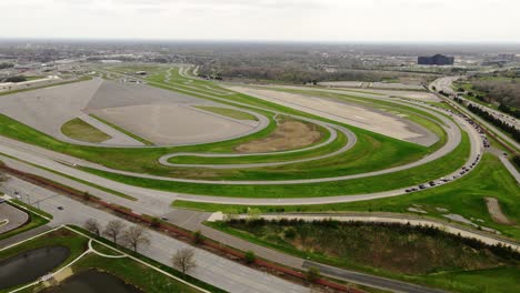 aerial circling shot of ford dearborn proving grounds, development center and driving dynamics laboratory, usa